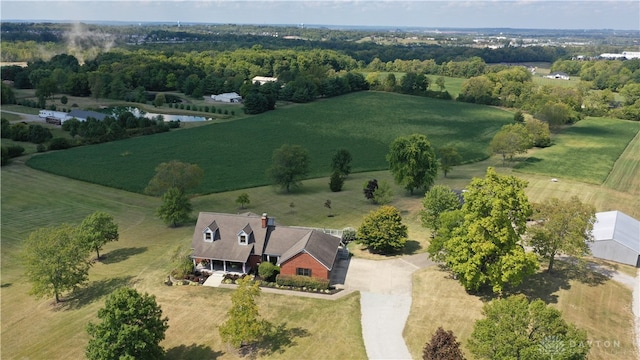 bird's eye view with a water view and a rural view