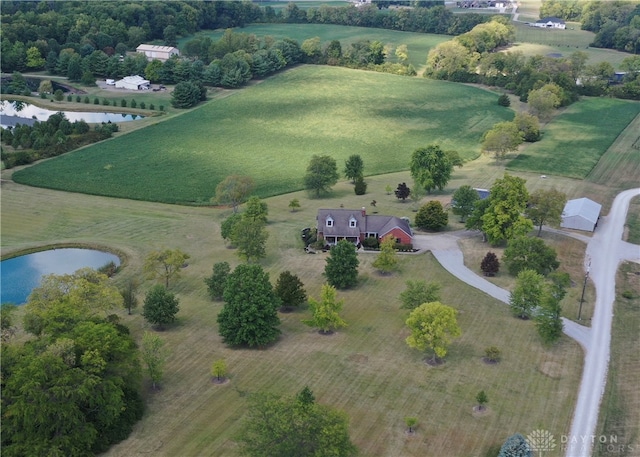 aerial view featuring a rural view and a water view