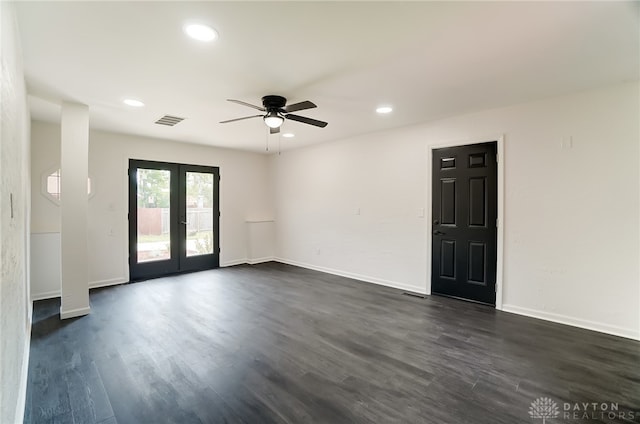 unfurnished room with dark wood-type flooring, ceiling fan, and french doors