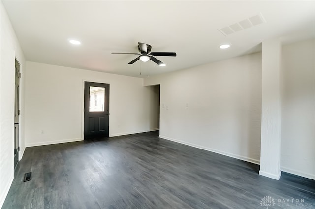 foyer entrance with dark wood-type flooring and ceiling fan