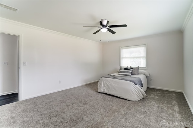 bedroom with carpet flooring, ceiling fan, and ornamental molding