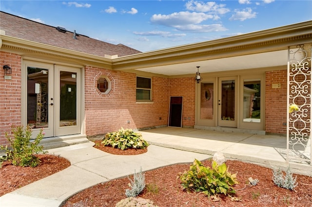 doorway to property featuring french doors