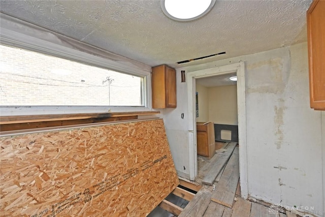 kitchen with a textured ceiling