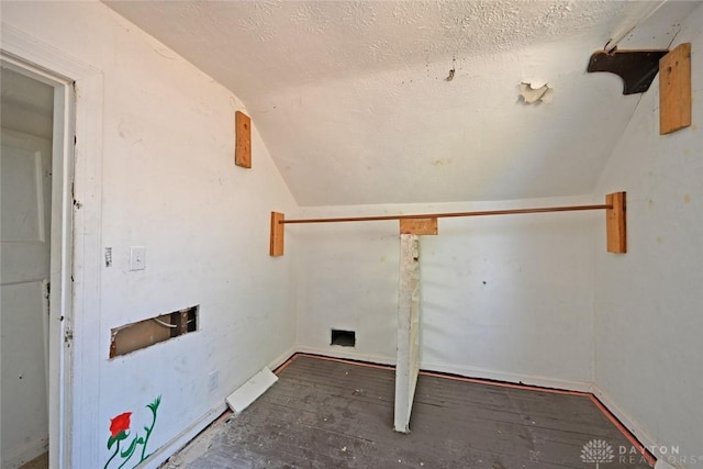 laundry room featuring a textured ceiling