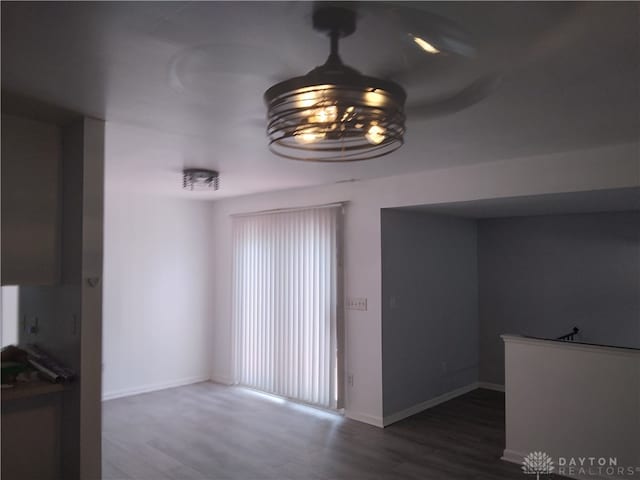 unfurnished living room featuring hardwood / wood-style flooring