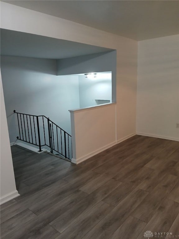 empty room featuring dark hardwood / wood-style floors