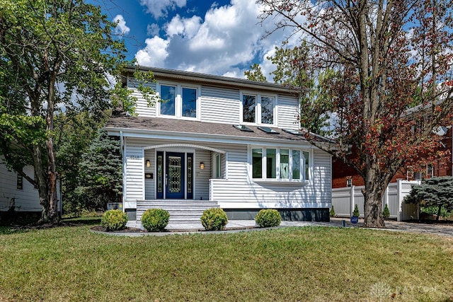 view of property featuring a front yard