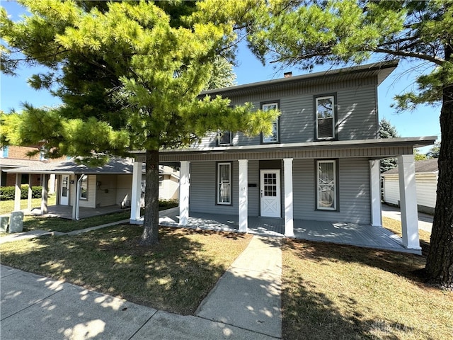 view of front of property featuring covered porch