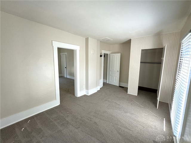 unfurnished bedroom with carpet flooring