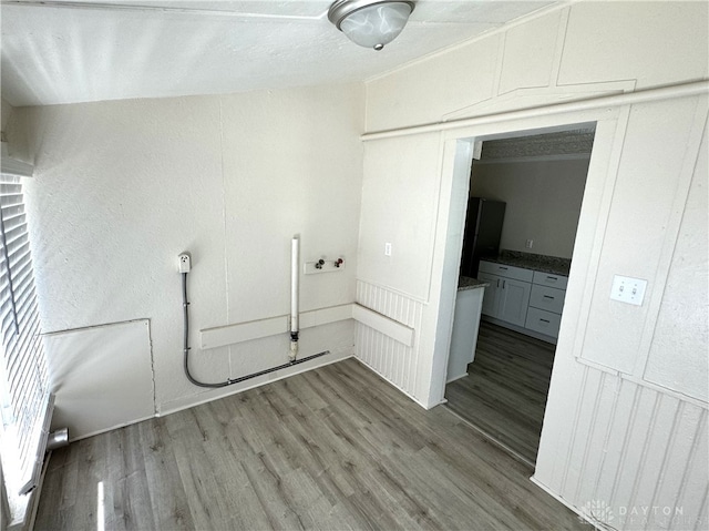 washroom with wood-type flooring