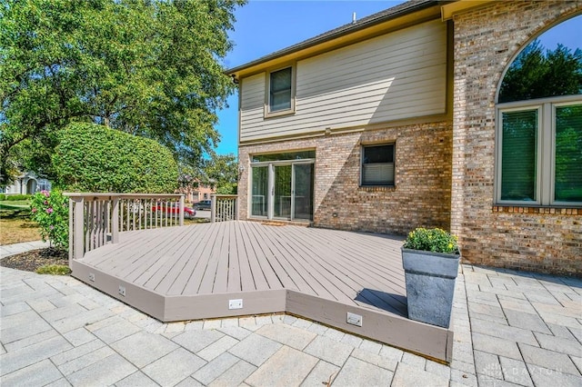 rear view of property with a deck