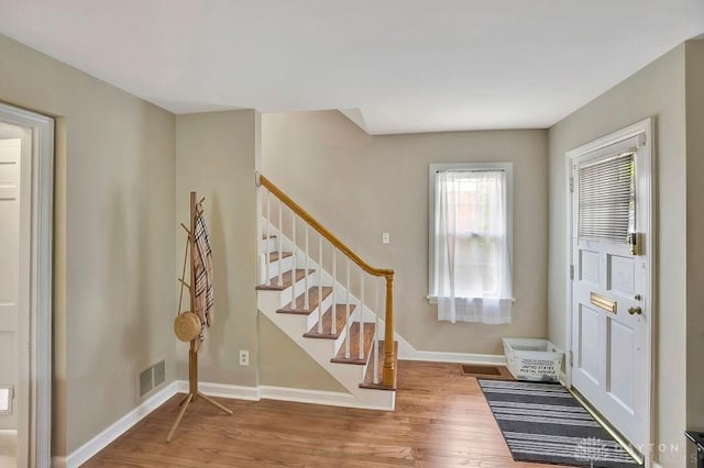 entrance foyer featuring hardwood / wood-style floors