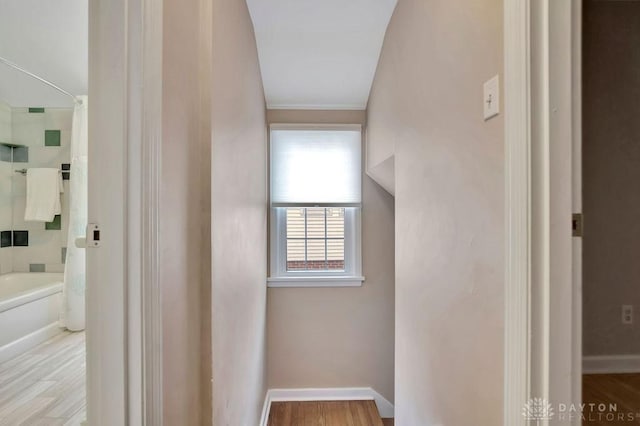 hall with light hardwood / wood-style floors