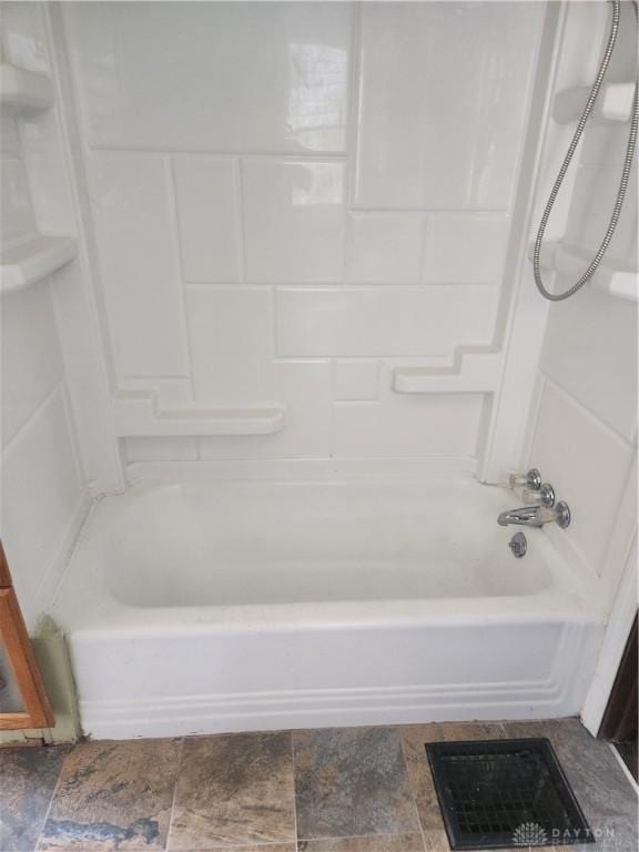 bathroom featuring shower / washtub combination