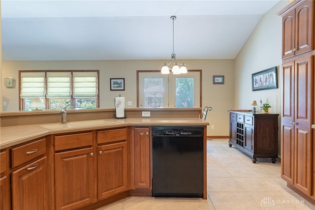 kitchen featuring a healthy amount of sunlight, lofted ceiling, black dishwasher, and sink