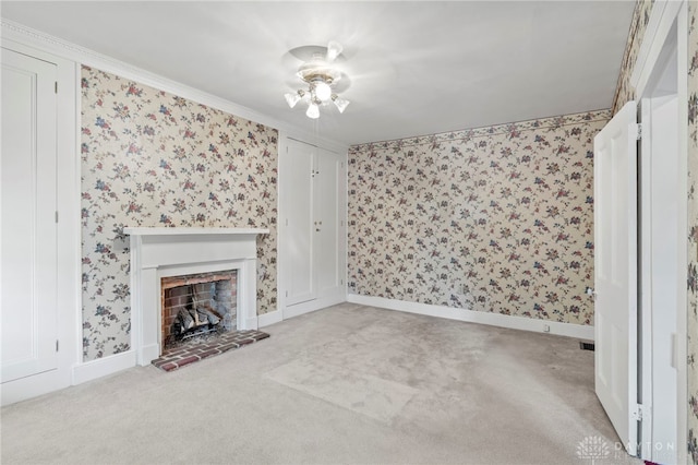 unfurnished living room with light carpet, ceiling fan, and ornamental molding