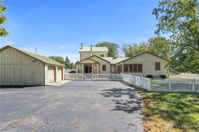 view of front of property with a garage