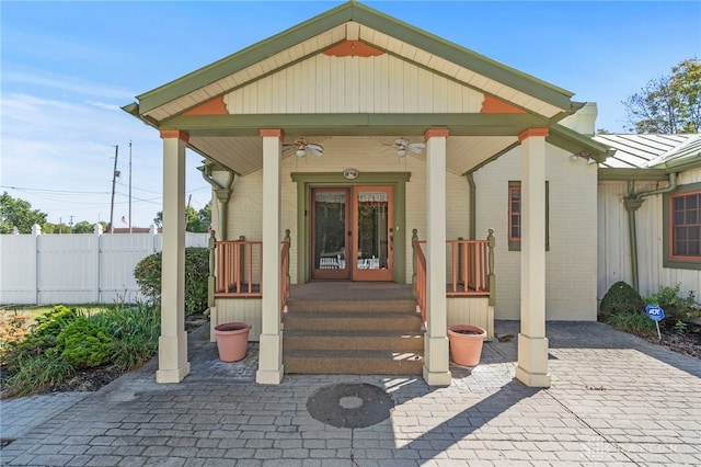 entrance to property with ceiling fan