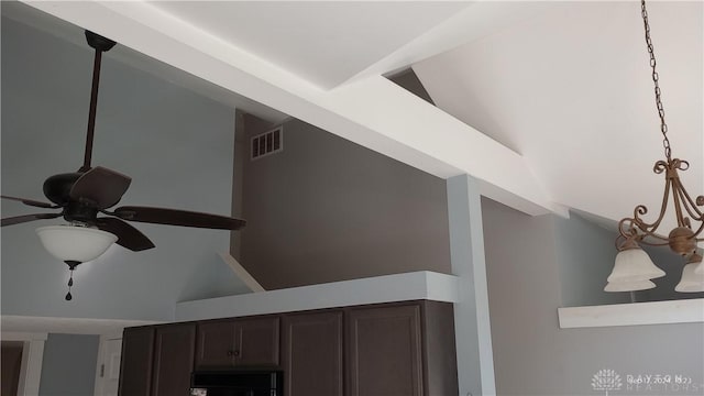 details with dark brown cabinets, visible vents, and ceiling fan