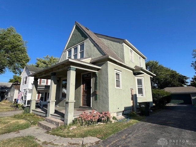 view of property exterior with a porch