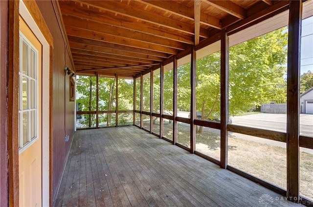 unfurnished sunroom featuring wooden ceiling