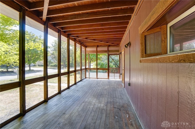 unfurnished sunroom with a healthy amount of sunlight