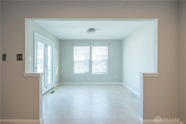 empty room featuring a wealth of natural light