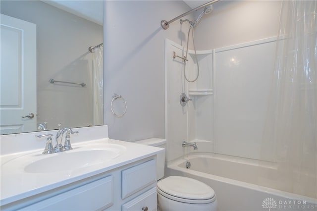 full bathroom featuring shower / tub combo, vanity, and toilet