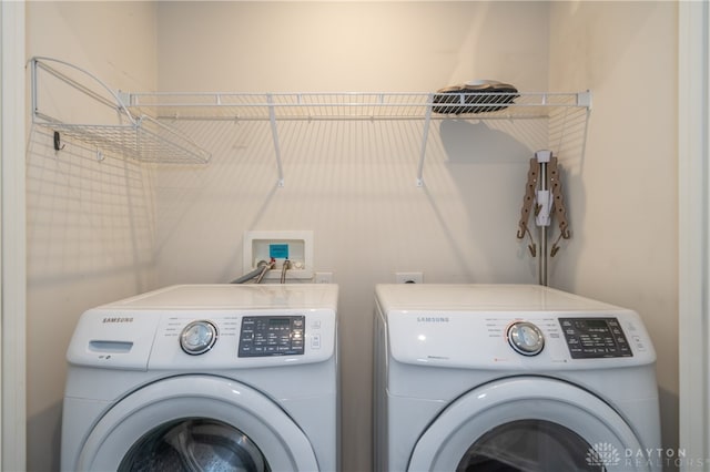 washroom with separate washer and dryer