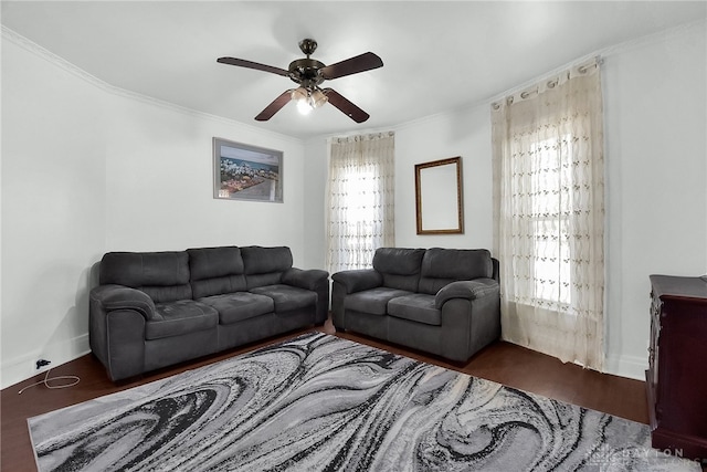 living room featuring ceiling fan and ornamental molding