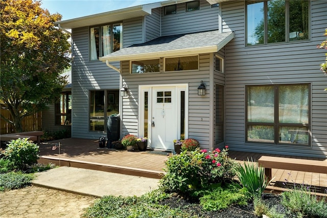 doorway to property with a deck