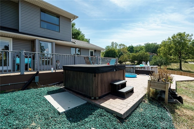 view of patio featuring a hot tub