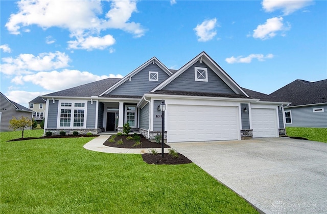 craftsman-style house with a garage and a front lawn