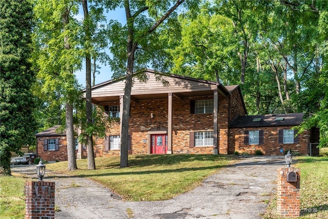 view of front of home with a front lawn