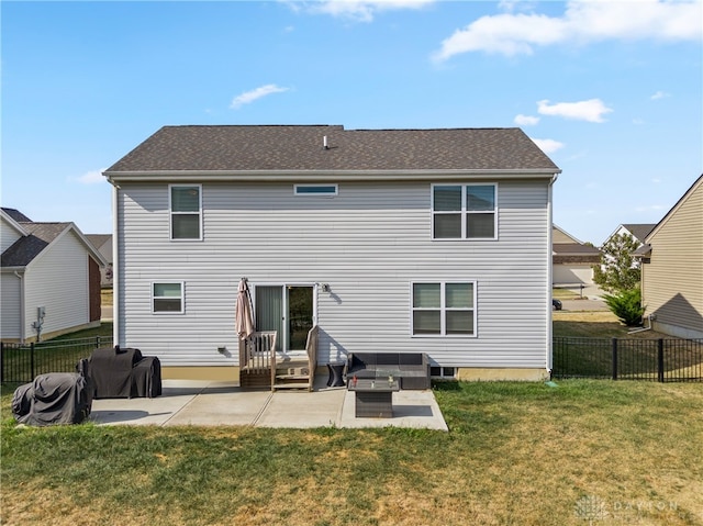 back of property featuring an outdoor living space, a lawn, and a patio area