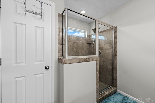 bathroom with an enclosed shower