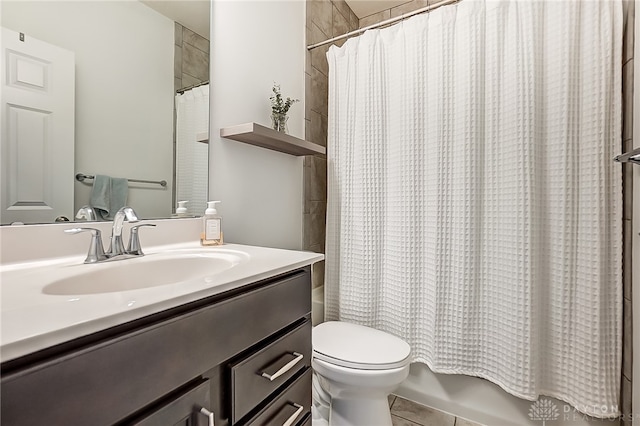 full bathroom featuring shower / bathtub combination with curtain, tile patterned floors, vanity, and toilet