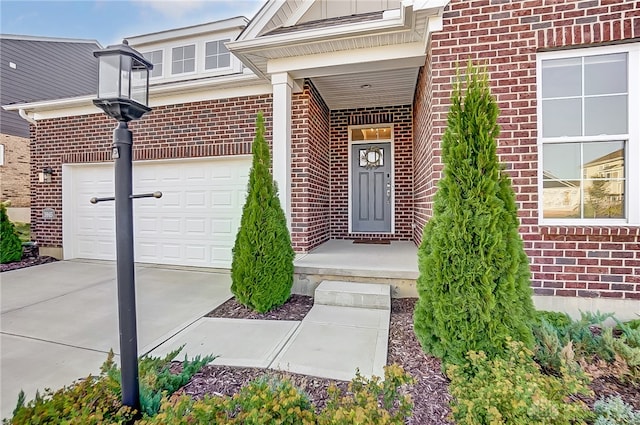 view of exterior entry featuring a garage