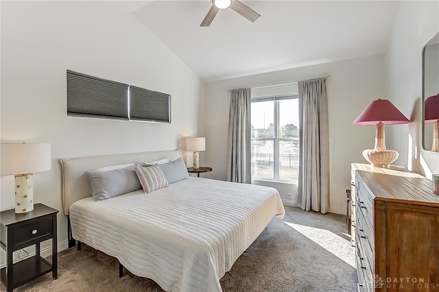 bedroom with light carpet, vaulted ceiling, and ceiling fan