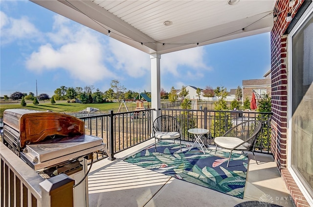 view of patio / terrace featuring a balcony