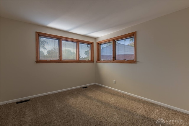 view of carpeted spare room