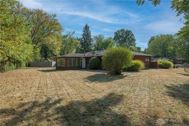 exterior space featuring a front yard