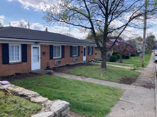 view of front of property with a front lawn