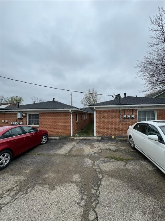 3136 Hassler St Unit 3136, Dayton, OH 45420 - view of side of property with brick siding