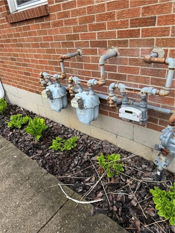 3136 Hassler St Unit 3136, Dayton, OH 45420 - exterior view of brick siding and gas meter