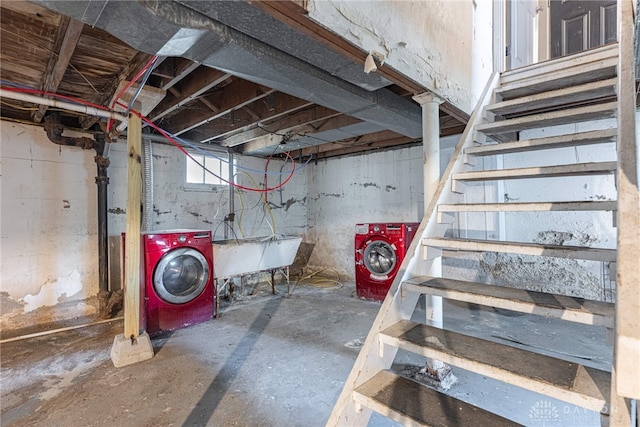 basement featuring washer / clothes dryer and sink