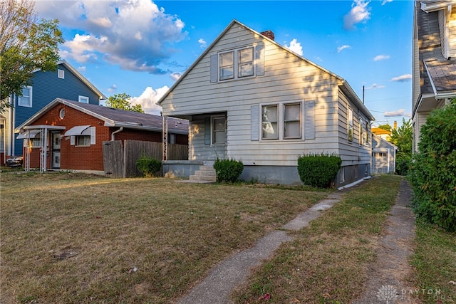 bungalow with a front lawn