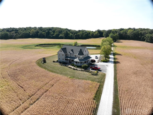 birds eye view of property featuring a rural view