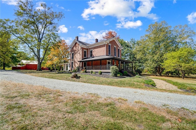 view of home's exterior featuring a lawn