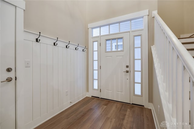 entrance foyer featuring dark hardwood / wood-style floors